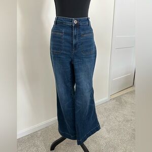 Women's Blue High-Waisted Flare Jeans. Super comfortable, and cute front pockets